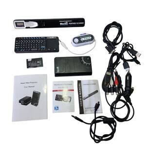Four Merlin gadgets portable scanner keyboard projector amfm transmitter